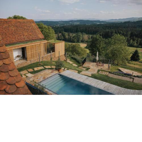 Am Wildbachberg - Luxus Ferienhäuser mit Infinitypool, Privatsauna und Weinkeller