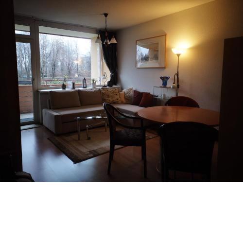 Kärnten Ossiacher See Apartment zwei Zimmer Ferienwohnung direkter Seezugang Strand beheizte Schwimmhalle